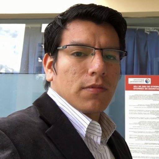 Profile Picture of Adrián Moreno (@zetxek), working side by side with a colleague: sitting on a desk, while looking at a screen